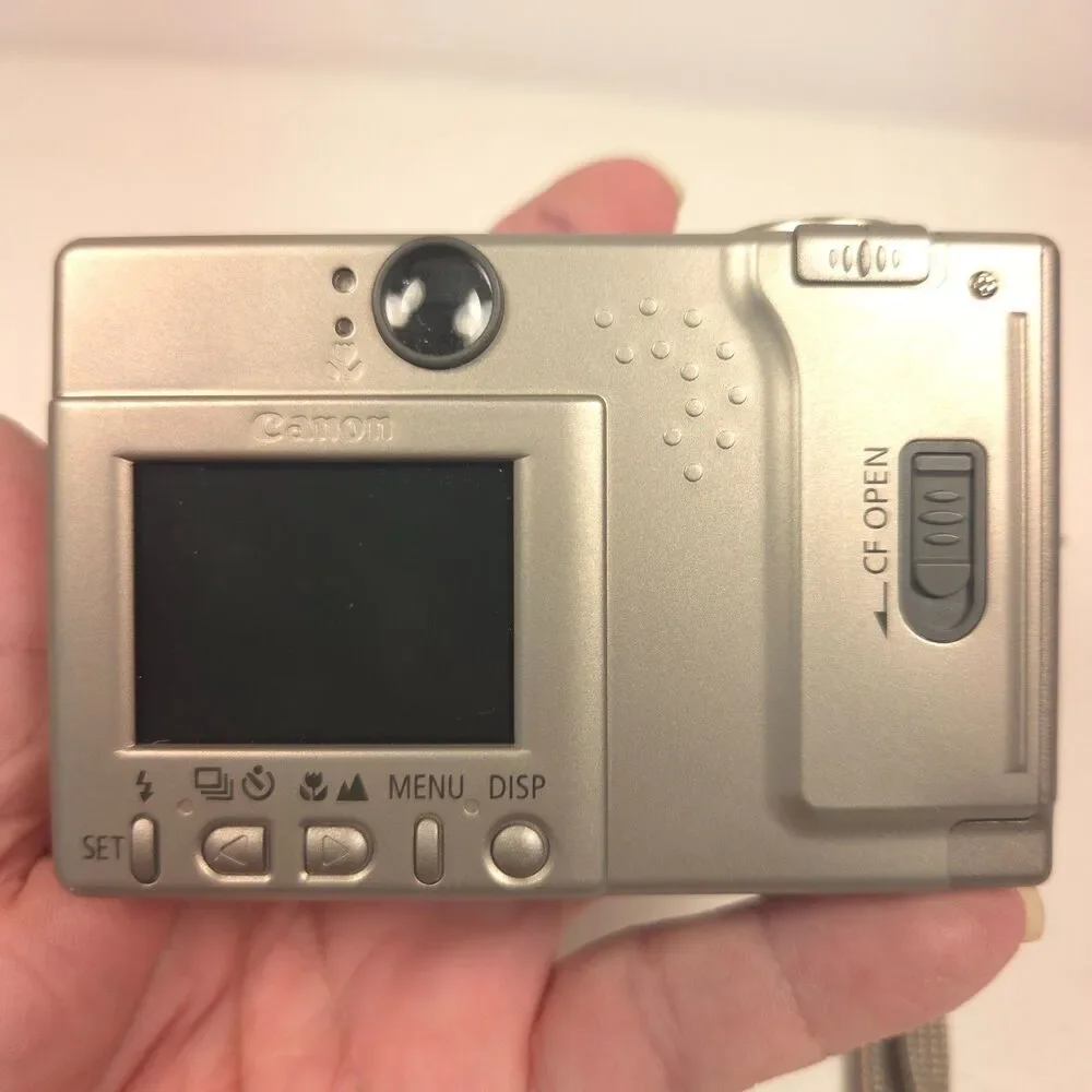 Canon PowerShot S100 Digital ELPH Camera Bundle Case Flash Battery Tested